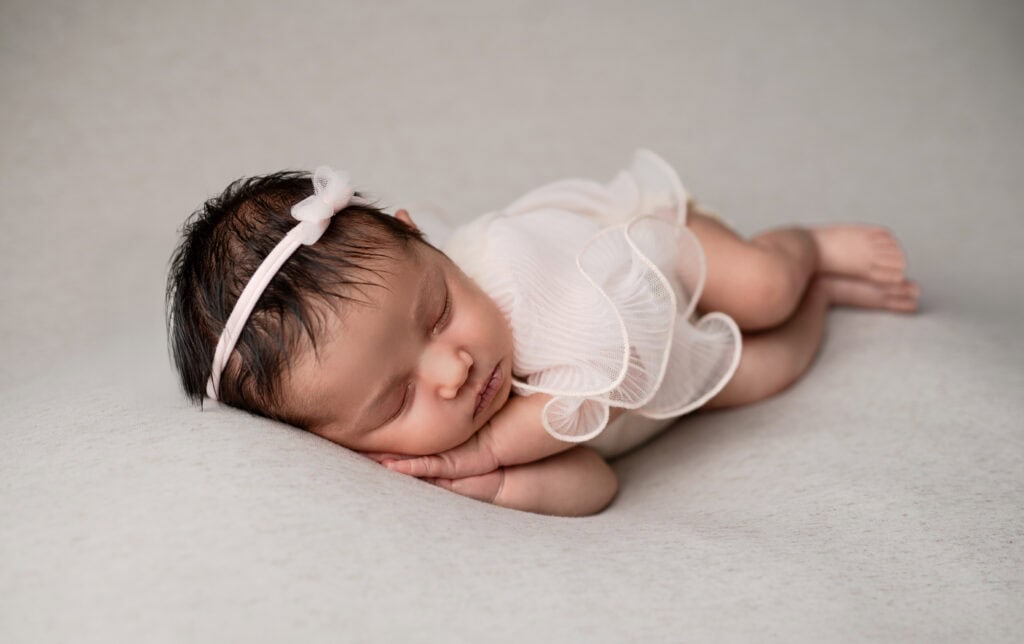 baby girl sleeping for posed newborn photography wichita ks