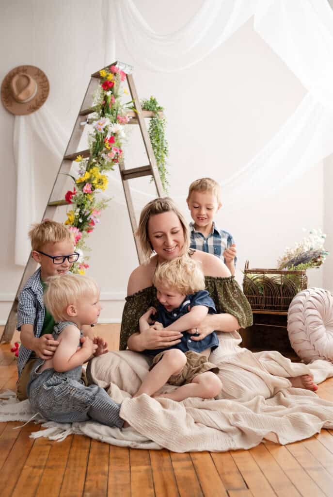 wichita newborn photographer SJ Nuzum Photography Sara tickles her sons